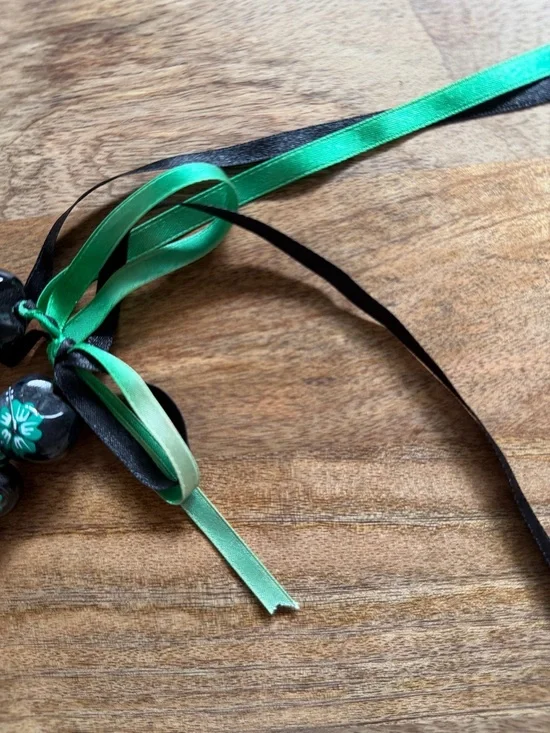 Hawaiian Kukui Nut Lei Green & Black Color Hibiscus Flower Necklace - Picture 4 of 4